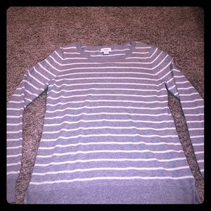 Gray and white long sleeve sweater.